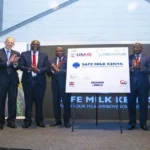 USAID representatives and Kenyan dairy producers participate in the Safe Milk Initiative to improve milk safety and quality standards.