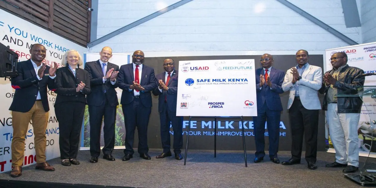 USAID representatives and Kenyan dairy producers participate in the Safe Milk Initiative to improve milk safety and quality standards.