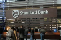Standard Bank Hits Record Profit as Fee Income Surge, Client Growth, and Market Volatility Drive Africa's Biggest Lender to New Heights